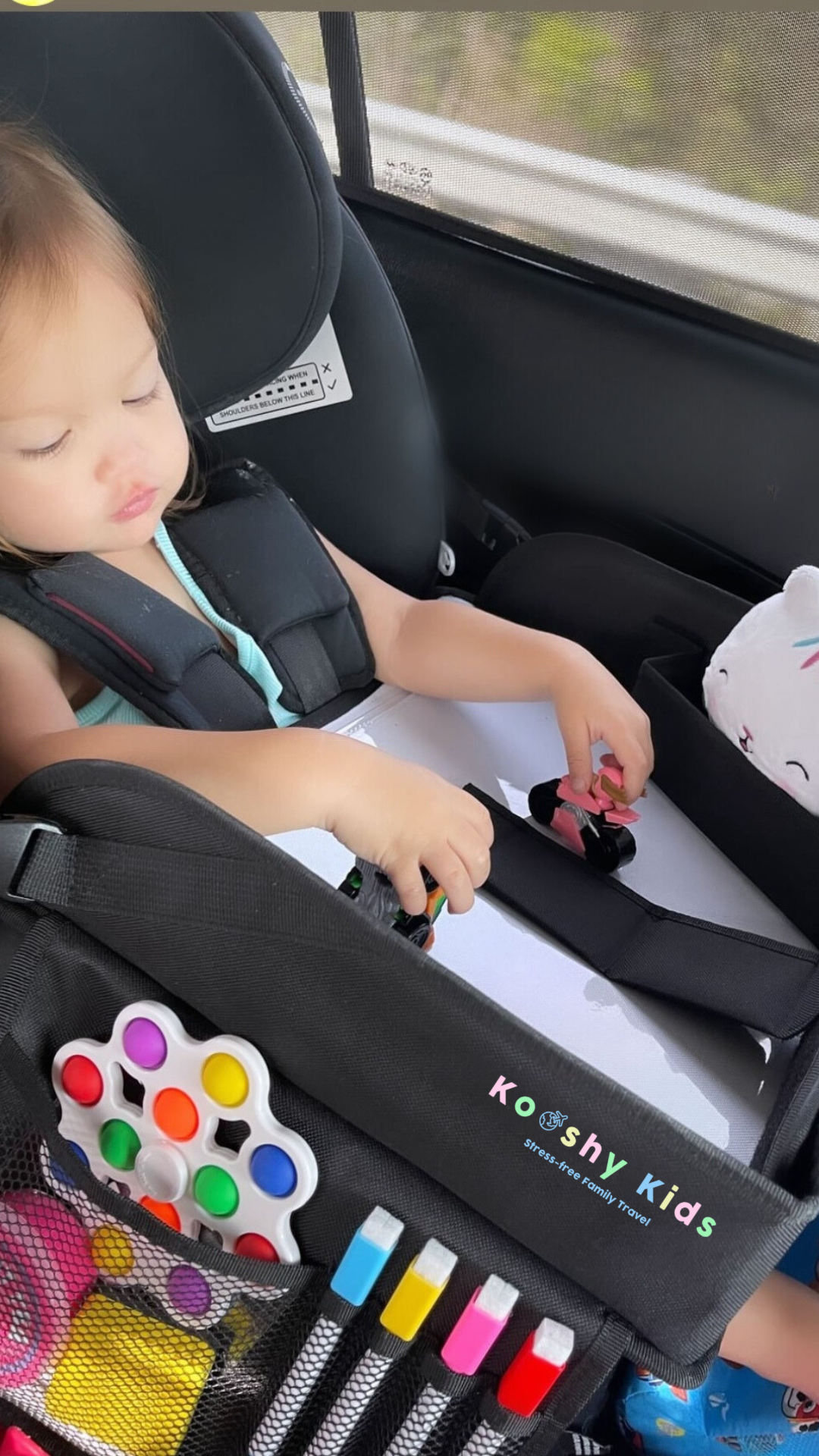 Travel tray for top rear facing car seat